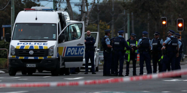 Police officers gather outside Linwood mosque after Friday's attacks, in Christchurch, New Zealand, March 16, 2019. REUTERS/Edgar Su