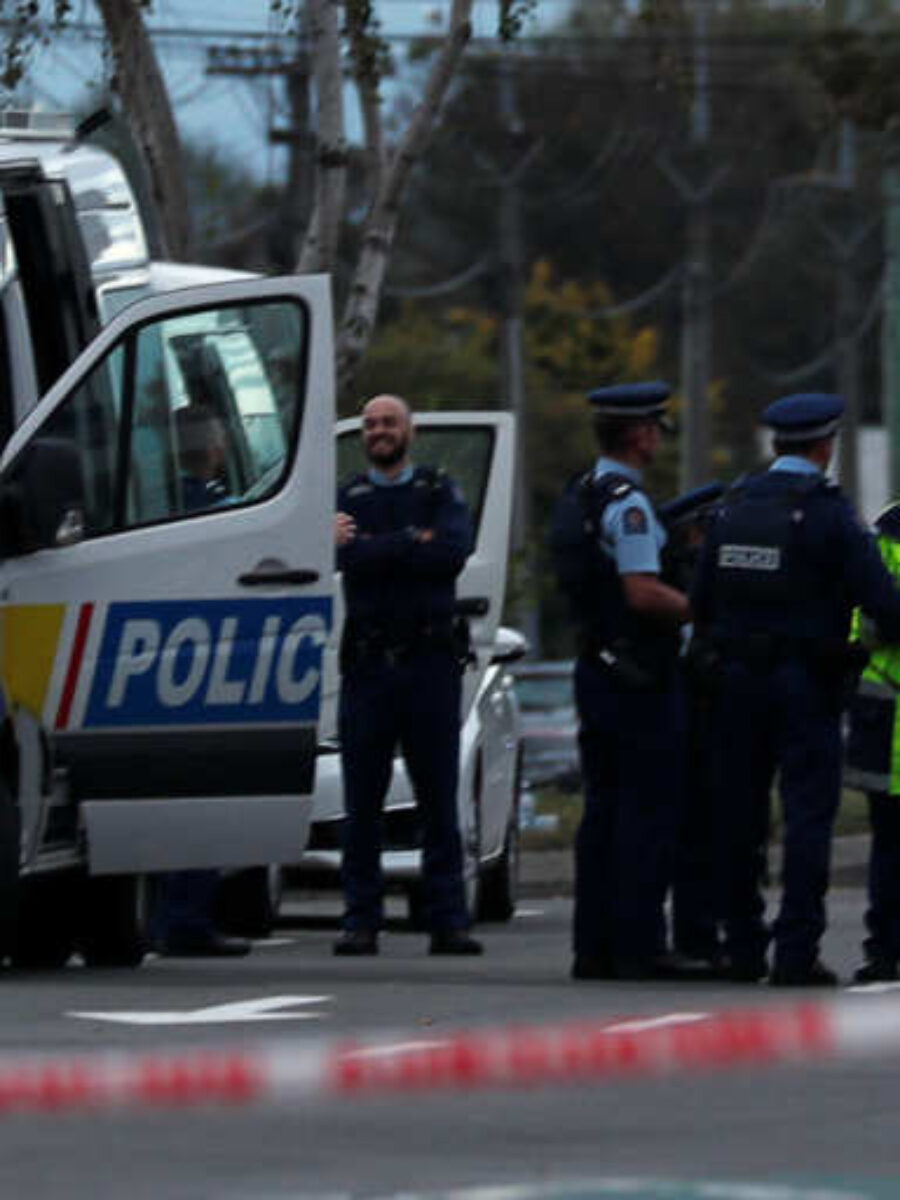 Police officers gather outside Linwood mosque after Friday's attacks, in Christchurch, New Zealand, March 16, 2019. REUTERS/Edgar Su