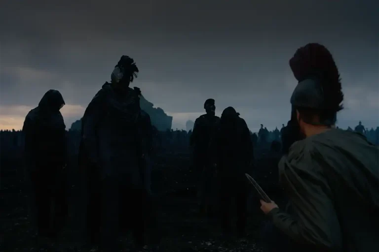 Dark, silhouetted figures confront a person holding a dagger.
